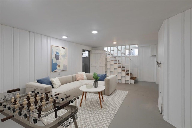 7241 N Kilpatrick Ave, Lincolnwood, IL 60712 - living area featuring stairway and concrete flooring