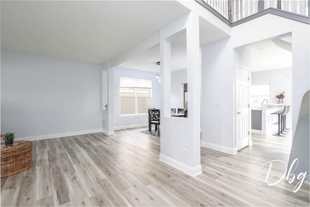 1943 Lily Ln, Round Lake, IL 60073 - unfurnished living room with light wood-style floors