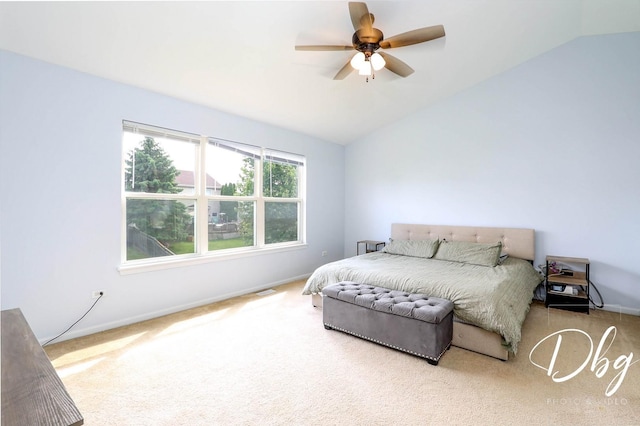 1943 Lily Ln, Round Lake, IL 60073 - carpeted bedroom with vaulted ceiling and a ceiling fan