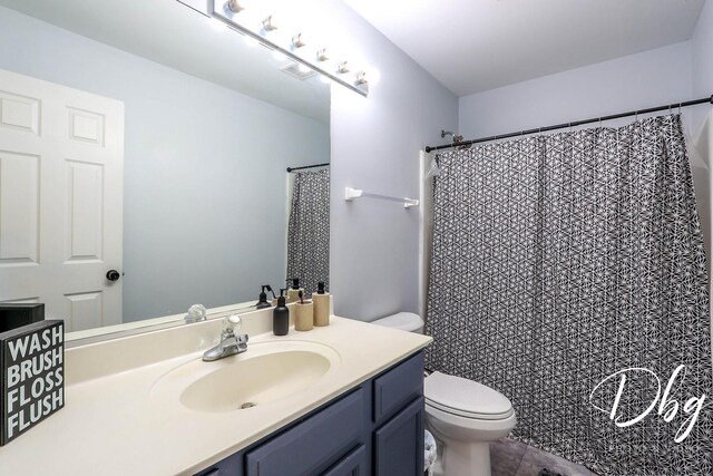 1943 Lily Ln, Round Lake, IL 60073 - bathroom with vanity, tile patterned floors, and curtained shower