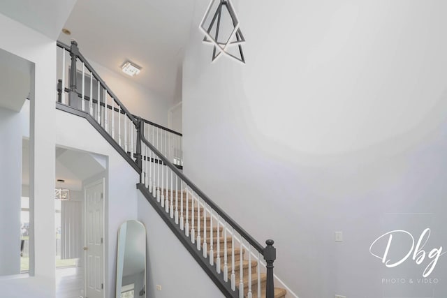 1943 Lily Ln, Round Lake, IL 60073 - stairs featuring a high ceiling