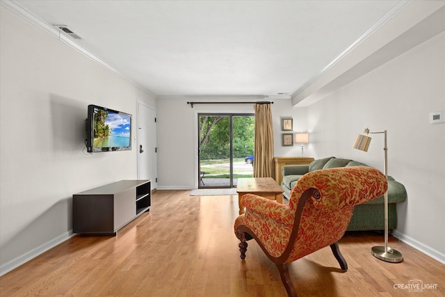 506 Taylor Ave Unit A, Glen Ellyn, IL 60137 - living room with ornamental molding, light wood-style flooring, and baseboards