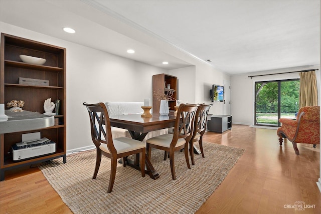 506 Taylor Ave Unit A, Glen Ellyn, IL 60137 - dining space with light wood finished floors, recessed lighting, crown molding, and baseboards