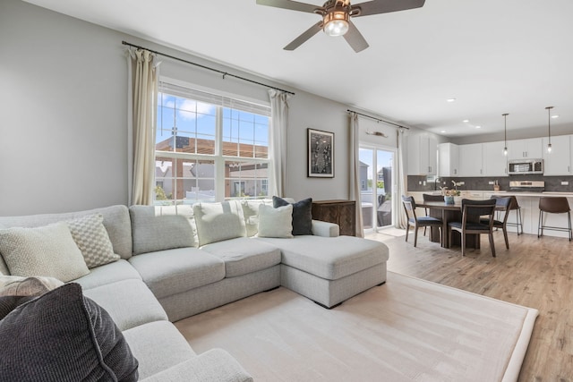 219 Conway St, Elburn, IL 60119 - living room featuring ceiling fan, light wood finished floors, and recessed lighting
