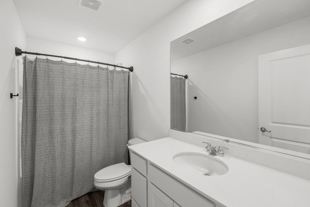 219 Conway St, Elburn, IL 60119 - bathroom featuring wood finished floors, vanity, a shower with shower curtain, and recessed lighting
