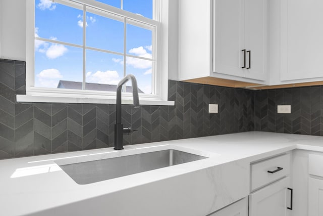 219 Conway St, Elburn, IL 60119 - kitchen with white cabinets and decorative backsplash