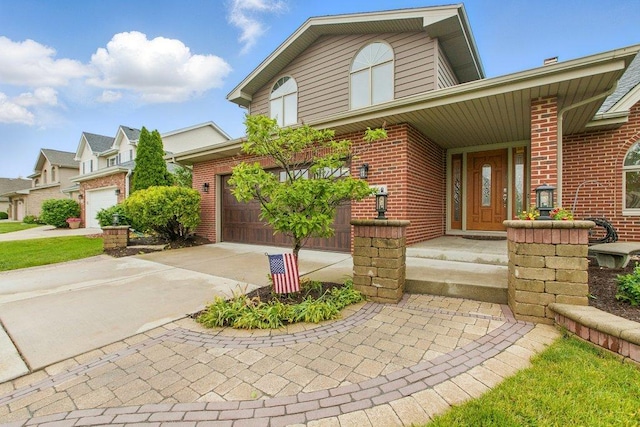 1650 Chauser Ln, Woodridge, IL 60517 - view of front of house with brick siding and concrete driveway