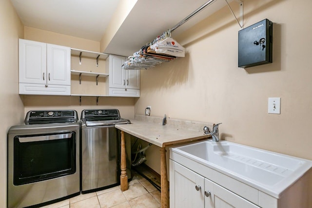 1650 Chauser Ln, Woodridge, IL 60517 - washroom with cabinet space, washing machine and clothes dryer, and light tile patterned floors