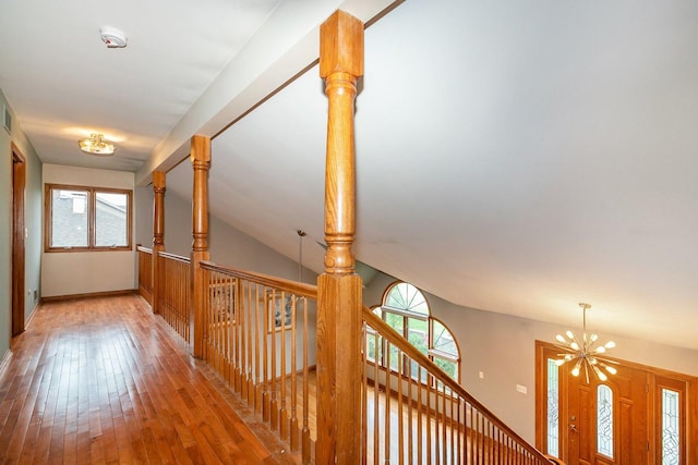 1650 Chauser Ln, Woodridge, IL 60517 - hall with a chandelier, light wood-style flooring, and baseboards