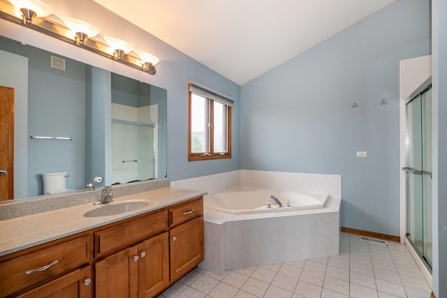 1650 Chauser Ln, Woodridge, IL 60517 - full bathroom featuring a bath, toilet, vanity, a stall shower, and tile patterned flooring