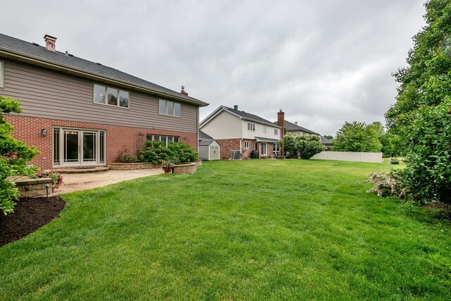 1650 Chauser Ln, Woodridge, IL 60517 - view of yard featuring a patio area