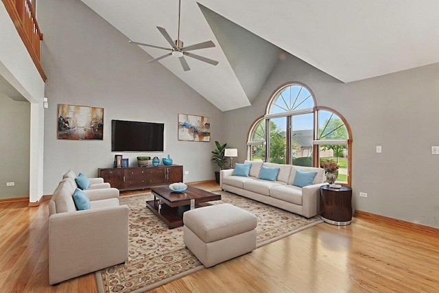 1650 Chauser Ln, Woodridge, IL 60517 - living room with high vaulted ceiling, a ceiling fan, wood finished floors, and baseboards
