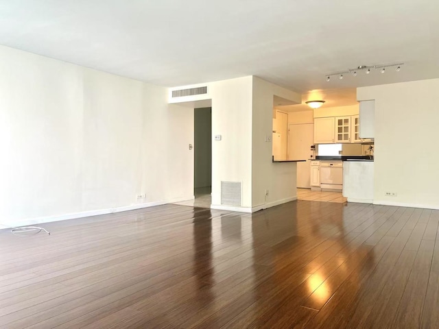 6033 N Sheridan Rd Unit 27C, Chicago, IL 60660 - unfurnished living room featuring light wood-style flooring and baseboards