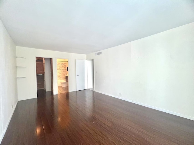 6033 N Sheridan Rd Unit 27C, Chicago, IL 60660 - unfurnished bedroom with wood finished floors and a closet