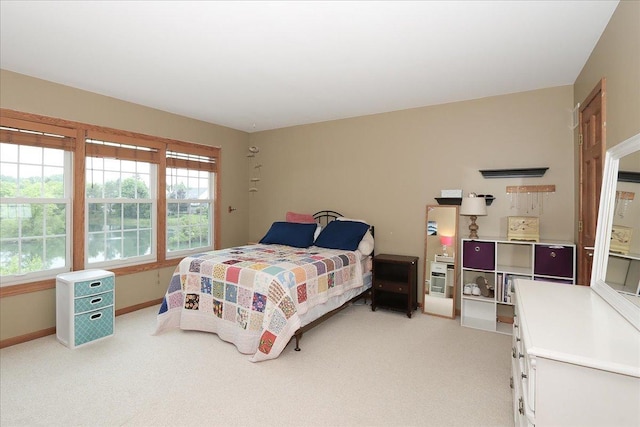 602 Cherbourg Dr, Buffalo Grove, IL 60089 - bedroom featuring light colored carpet and baseboards