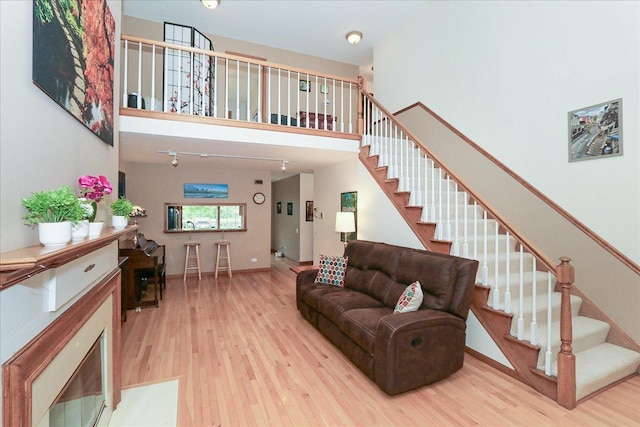 602 Cherbourg Dr, Buffalo Grove, IL 60089 - living room with wood finished floors, stairs, and a high ceiling