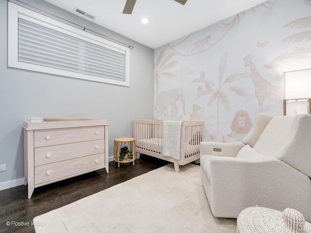 1229 N Cleaver St Unit 1, Chicago, IL 60642 - bedroom featuring wood finished floors, a crib, a ceiling fan, and recessed lighting