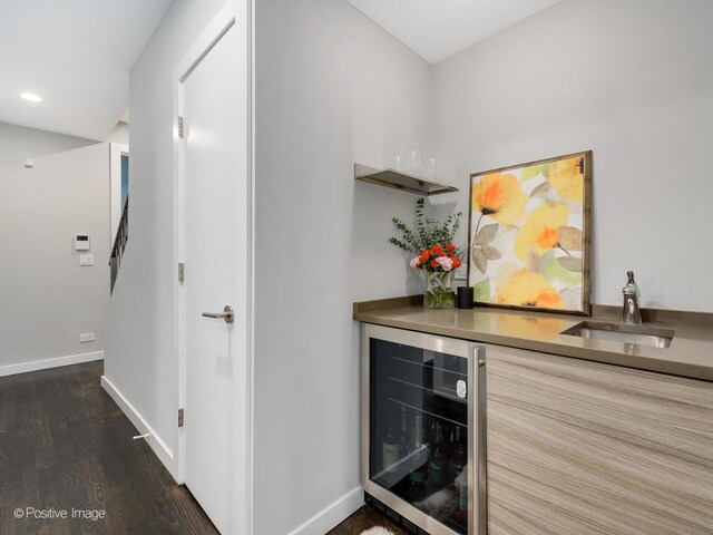 1229 N Cleaver St Unit 1, Chicago, IL 60642 - indoor dry bar with wine cooler, dark wood-style flooring, and recessed lighting