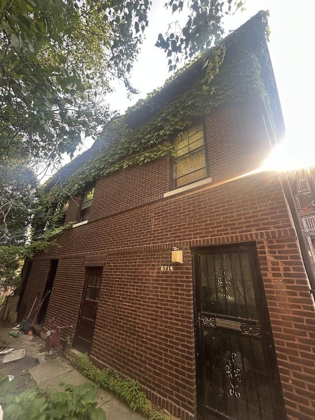 6714 S Paxton Ave, Chicago, IL 60649 - view of home's exterior featuring brick siding
