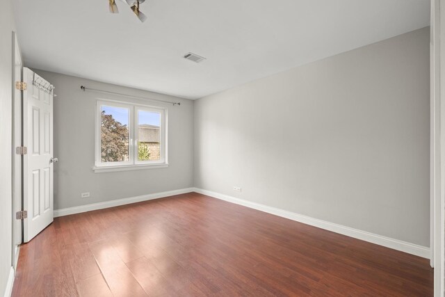 5332 N Delphia Ave Unit 108, Chicago, IL 60656 - unfurnished bedroom with wood finished floors and baseboards