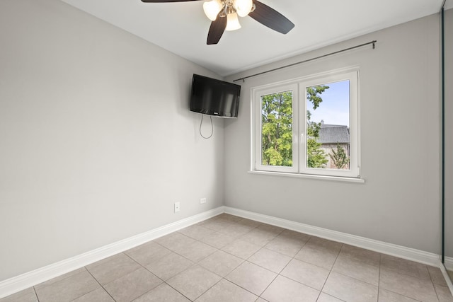 5332 N Delphia Ave Unit 108, Chicago, IL 60656 - empty room featuring ceiling fan, light tile patterned flooring, and baseboards