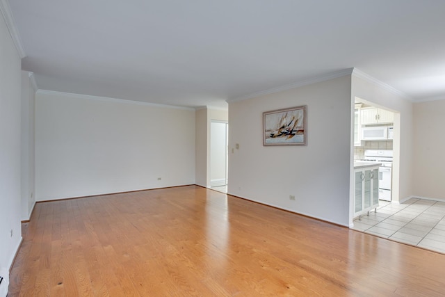 43 N Main St Unit 12, Glen Ellyn, IL 60137 - empty room with light wood-type flooring, ornamental molding, and baseboards
