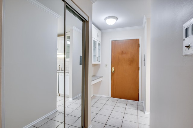 43 N Main St Unit 12, Glen Ellyn, IL 60137 - entryway featuring light tile patterned floors, crown molding, and baseboards