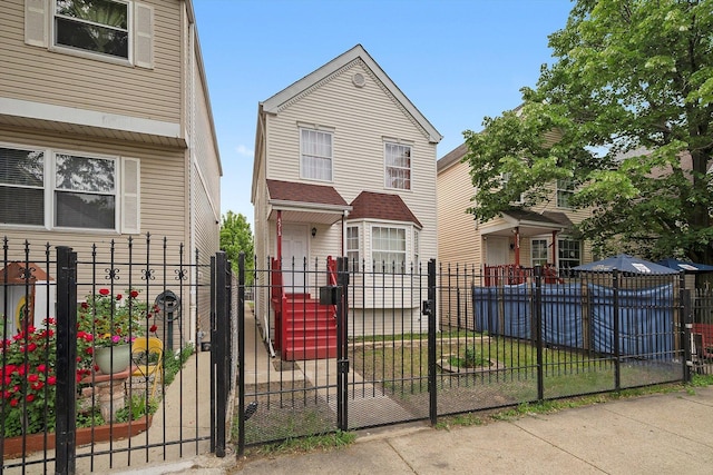 4513 S Wood St, Chicago, IL 60609 - view of front of home with a fenced front yard and a gate
