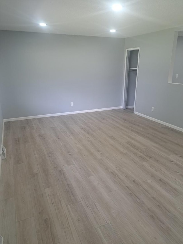 3025 Central Ave, Rockford, IL 61102 - unfurnished room featuring light wood-style floors, baseboards, and recessed lighting