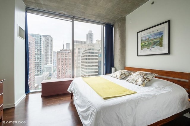 600 N Fairbanks Ct Unit 1707, Chicago, IL 60611 - bedroom featuring multiple windows, wood finished floors, a city view, and floor to ceiling windows