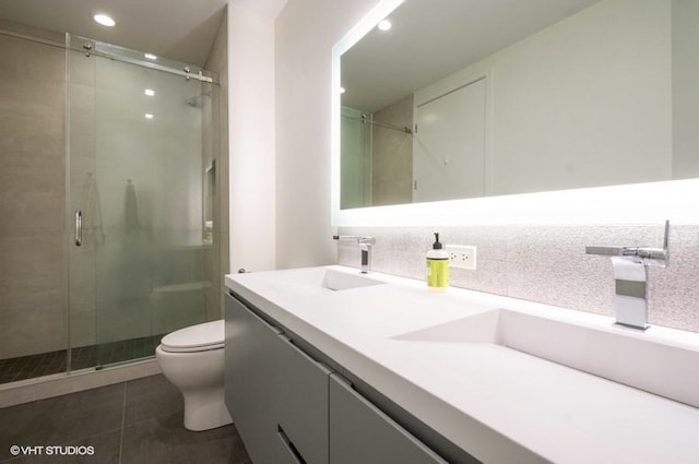 600 N Fairbanks Ct Unit 1707, Chicago, IL 60611 - bathroom with toilet, tile patterned floors, a shower stall, double vanity, and recessed lighting