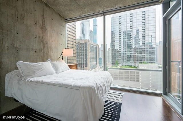 600 N Fairbanks Ct Unit 1707, Chicago, IL 60611 - bedroom featuring wood finished floors, multiple windows, and a city view