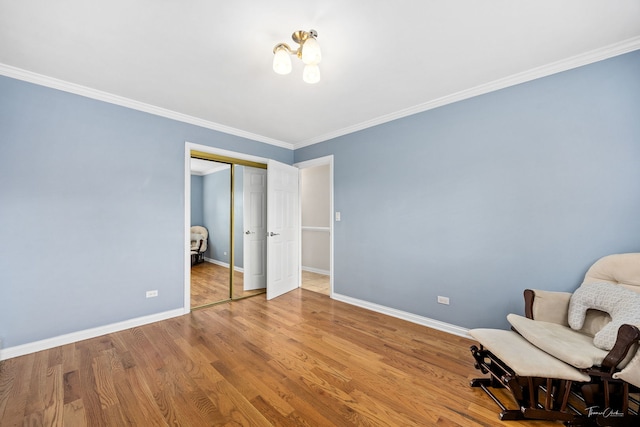 805 N Delphia Ave, Park Ridge, IL 60068 - living area featuring baseboards, ornamental molding, and wood finished floors