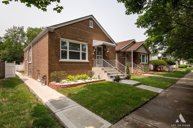 12480 S Wabash Ave, Chicago, IL 60628 - bungalow featuring brick siding