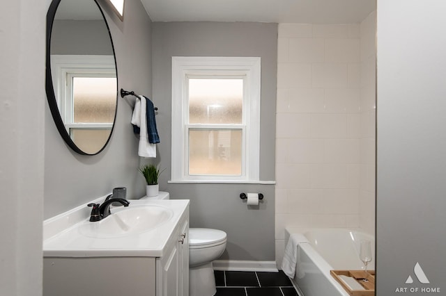 12480 S Wabash Ave, Chicago, IL 60628 - full bathroom with vanity, toilet, tile patterned floors, and baseboards