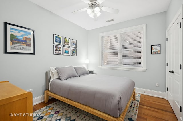 2338 W Roscoe St Unit 2E, Chicago, IL 60618 - bedroom featuring wood finished floors, a closet, and a ceiling fan