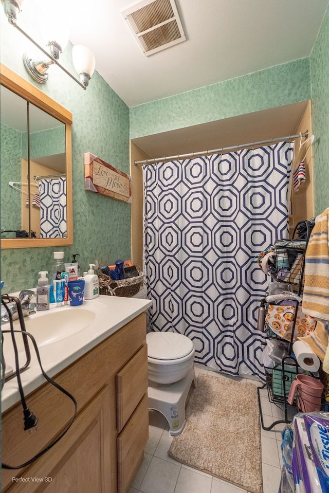 222 Oakwood Ln, Bloomingdale, IL 60108 - bathroom with tile patterned flooring, vanity, toilet, and a shower with shower curtain
