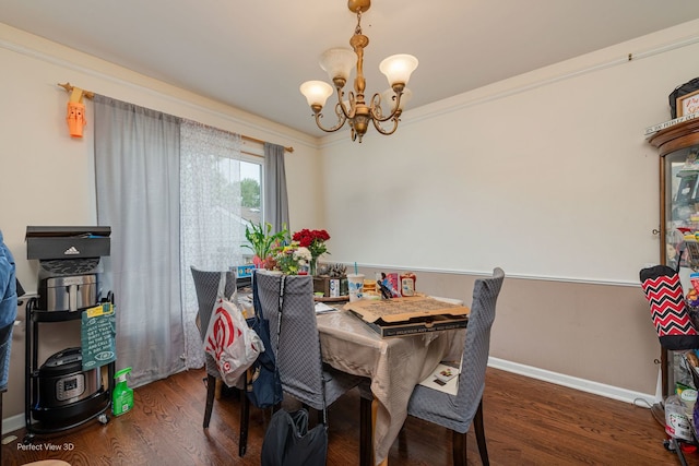 222 Oakwood Ln, Bloomingdale, IL 60108 - dining space with a chandelier, wood finished floors, and baseboards