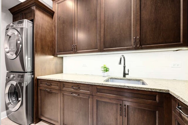 808 Maple Ave, Downers Grove, IL 60515 - laundry area featuring cabinet space and stacked washing machine and dryer