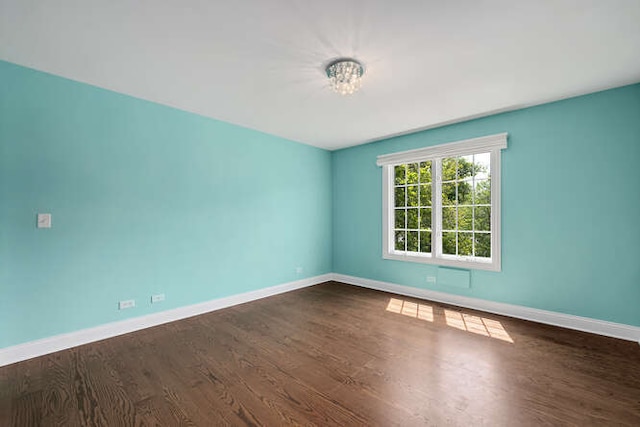 808 Maple Ave, Downers Grove, IL 60515 - spare room featuring dark wood finished floors and baseboards