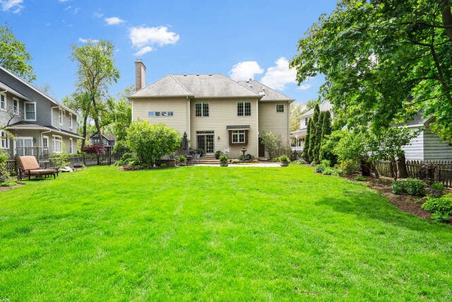 808 Maple Ave, Downers Grove, IL 60515 - rear view of house featuring a chimney