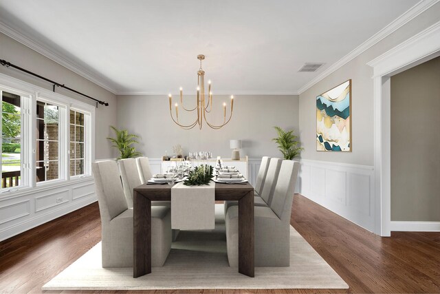 808 Maple Ave, Downers Grove, IL 60515 - dining area featuring a chandelier, wood finished floors, crown molding, a decorative wall, and wainscoting