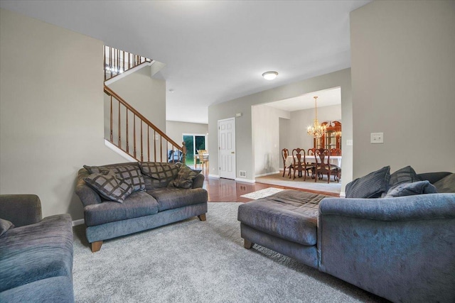2585 Lambert Dr, Aurora, IL 60503 - living room featuring a chandelier and stairway