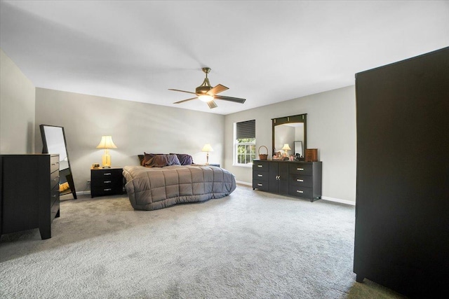 2585 Lambert Dr, Aurora, IL 60503 - carpeted bedroom featuring baseboards and ceiling fan