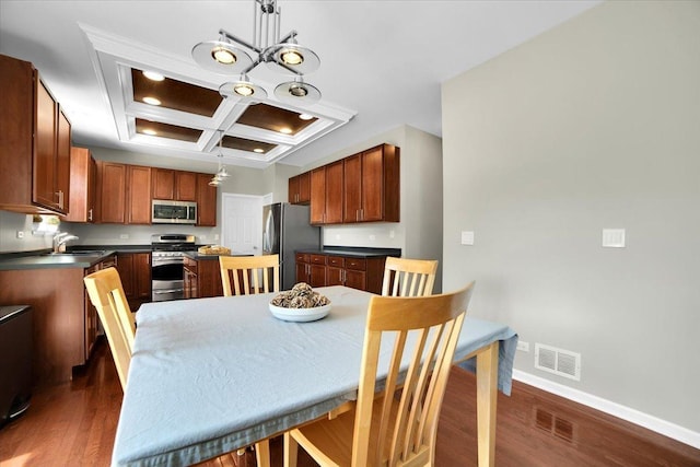 2585 Lambert Dr, Aurora, IL 60503 - dining space with coffered ceiling, dark wood-style floors, beam ceiling, and recessed lighting