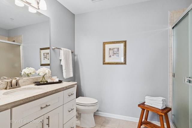 3975 Idlewild Ln Unit 200, Naperville, IL 60564 - bathroom with vanity, toilet, a shower stall, tile patterned floors, and baseboards