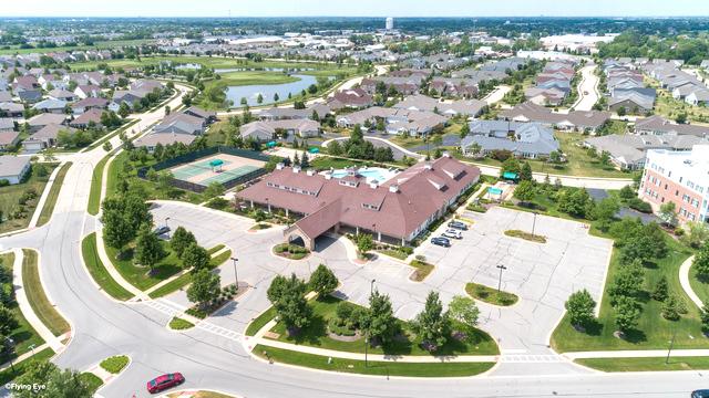 3975 Idlewild Ln Unit 200, Naperville, IL 60564 - aerial perspective of suburban area with a large body of water