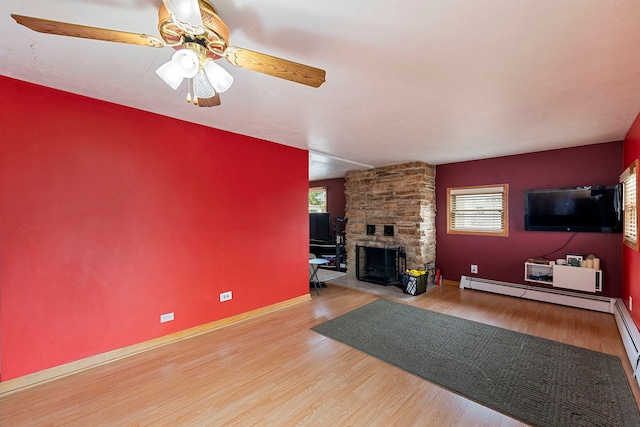 10608 Moody Ave, Chicago Ridge, IL 60415 - living room with wood finished floors, healthy amount of natural light, and a stone fireplace