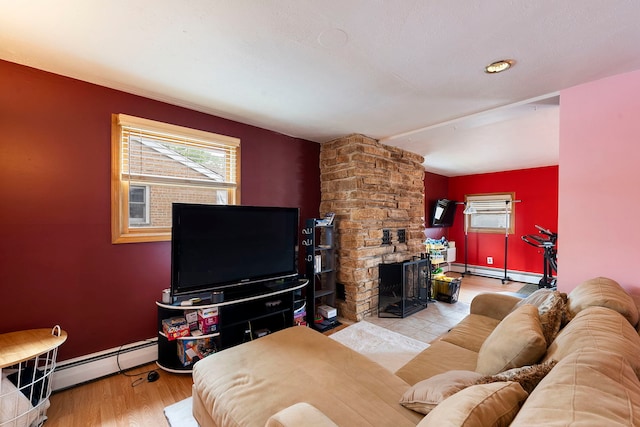 10608 Moody Ave, Chicago Ridge, IL 60415 - living room featuring baseboard heating, a fireplace, and baseboards