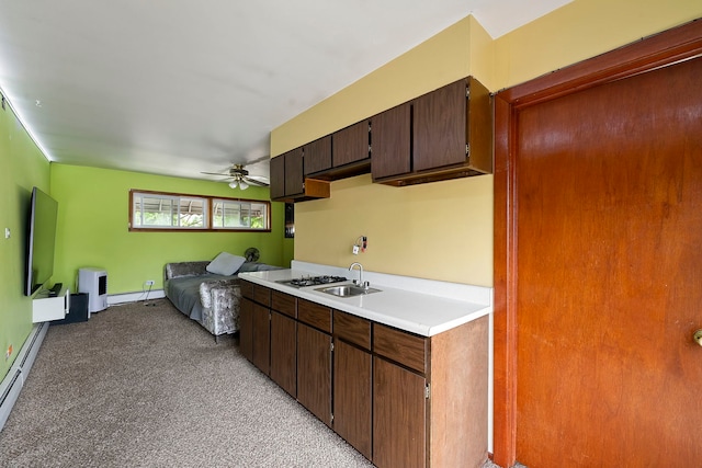 10608 Moody Ave, Chicago Ridge, IL 60415 - kitchen featuring a ceiling fan, light countertops, baseboard heating, a sink, and light carpet